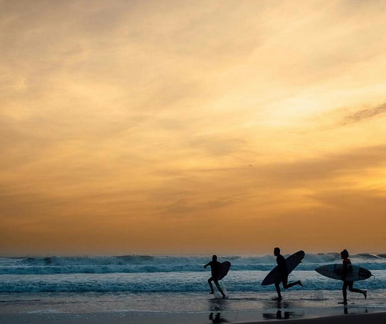 Surfing in Carcavelos, Lisbon, Portugal