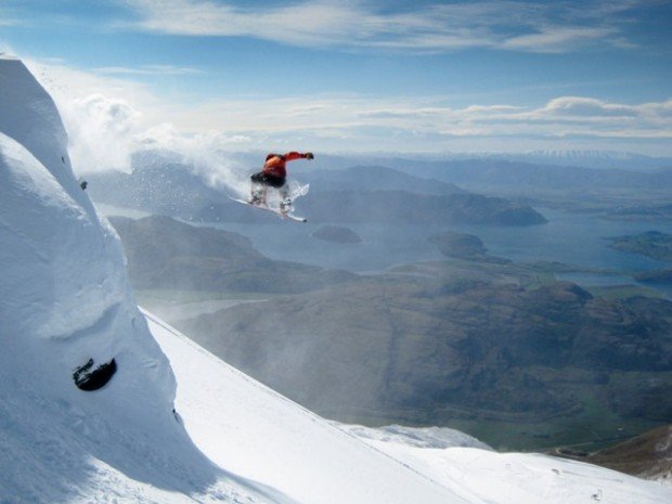 "Snowboarder jumping in the air"