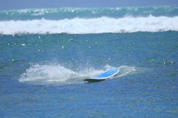 "Surfing Kahului Harbour"