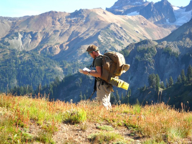 "A lonely backpacker walking up the hills at Yosemite National Park"