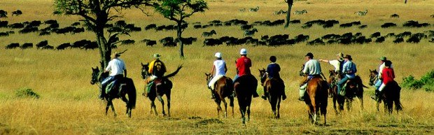 "Horseback Riders at Maasai Mara National Reserve"