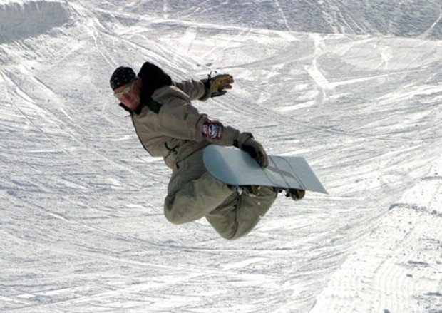 "Snowboarder at Mont Olympia"