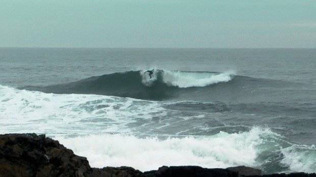 "Surfer at Broadsea Point"