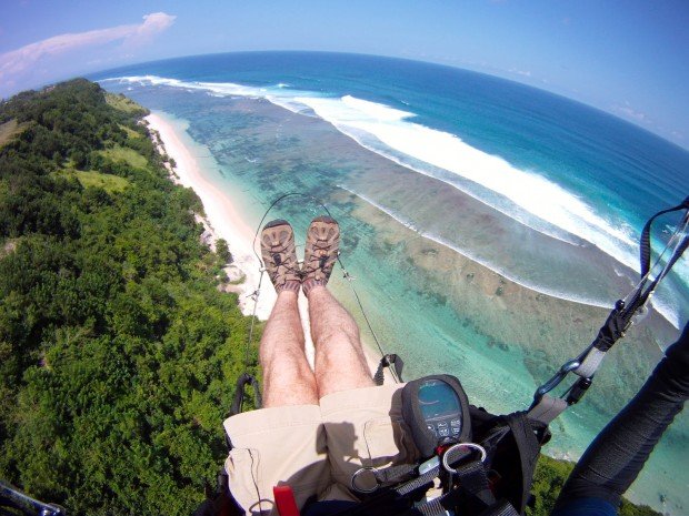 "Paragliding from the cliffs of Bali"