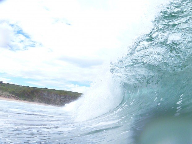 "Surfing at Clifton Beach"
