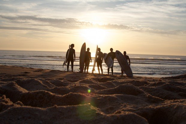 "Surfing at Praia da Areia Branca"