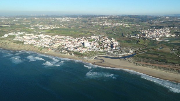 "Surfing at Praia da Areia Branca"