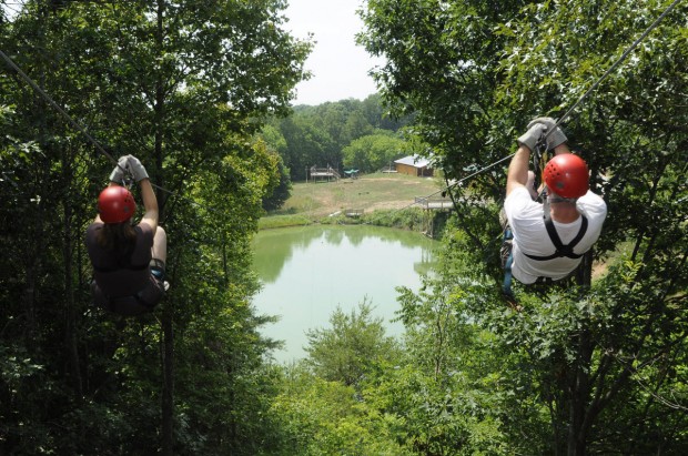 "Ziplining over a lake"