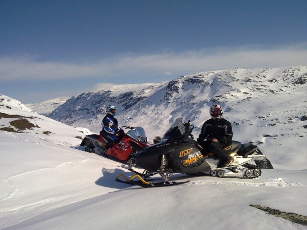"Snowmobiling across Riksgransen Resort"