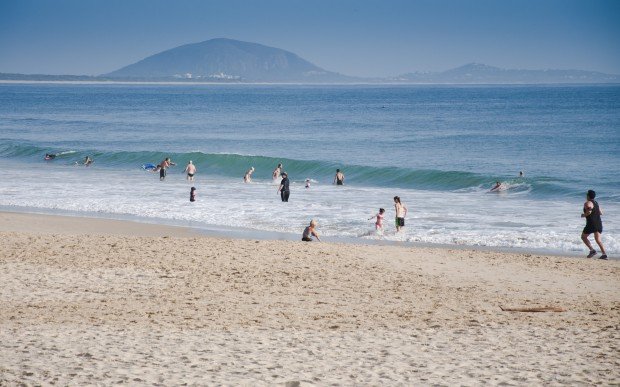 "Surfing at Mooloolaba beach"