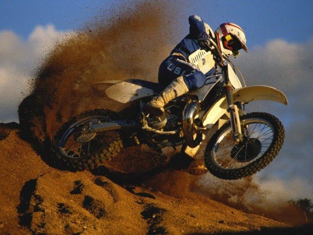 "Motocross Rider in Filthy Trails"