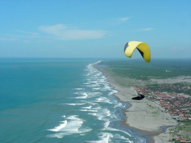 "Paragliding at Parangtritis Beach"