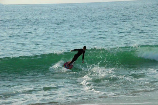 "Skimboarding at Treasure Island Beach"