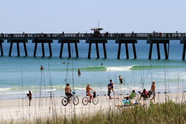 "Surfing at Jax Beach Pier"