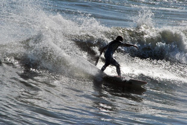"Surfing at Jax Beach Pier"
