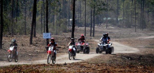 "Motocross riders in Big Nasty ATV Park"