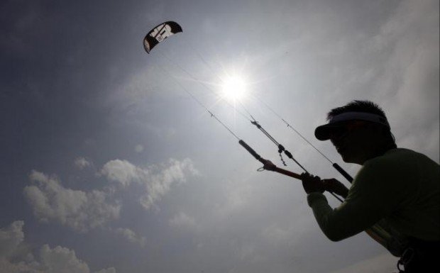 "Kiteboarding at Shui Hau Wan Beach"