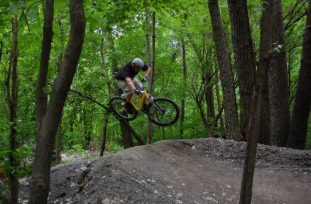 "BMX Dirt Jumping in The Garden"