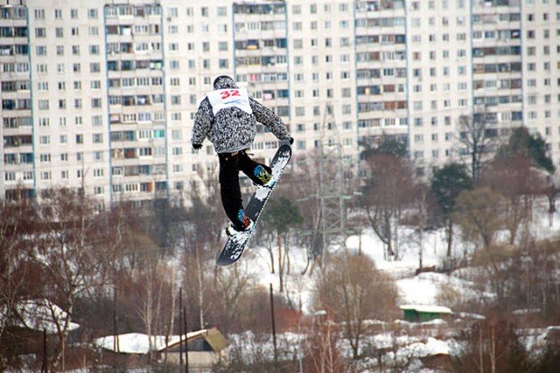 "Snowboarder jumping in Novo Peredelkino"