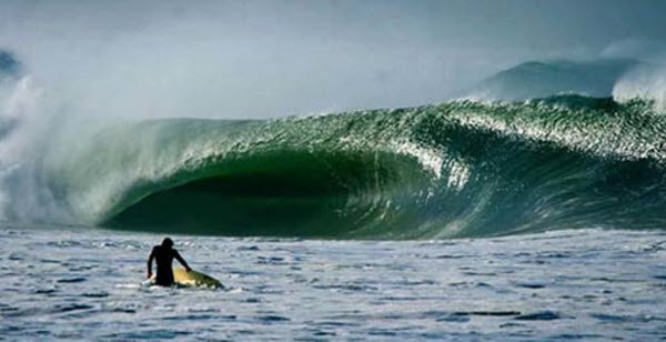 "Surfer facing a wave in Supertubos"