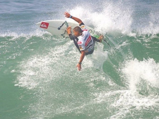 "Surfer in Praia da Guincho"