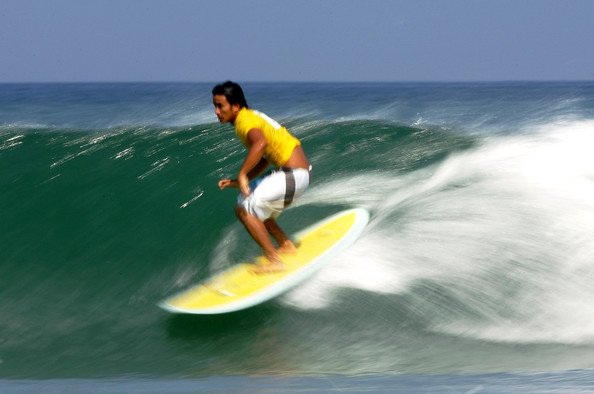 ''Surfing at Kuta Beach''