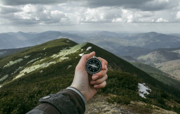 Image source: https://unsplash.com/photos/person-holding-silver-compass-xu2WYJek5AI