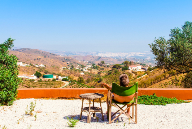 Image source: https://www.pexels.com/photo/man-sitting-on-green-chair-near-trees-and-mountain-under-blue-sky-at-daytime-1106479/