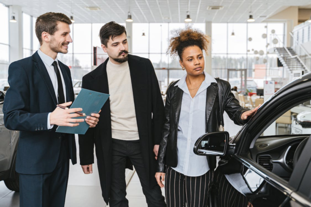 Image Source: https://www.pexels.com/photo/a-couple-at-a-car-dealership-7144191/