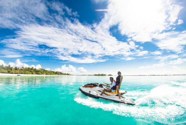 https://www.pexels.com/photo/two-people-riding-a-jet-ski-1430676/